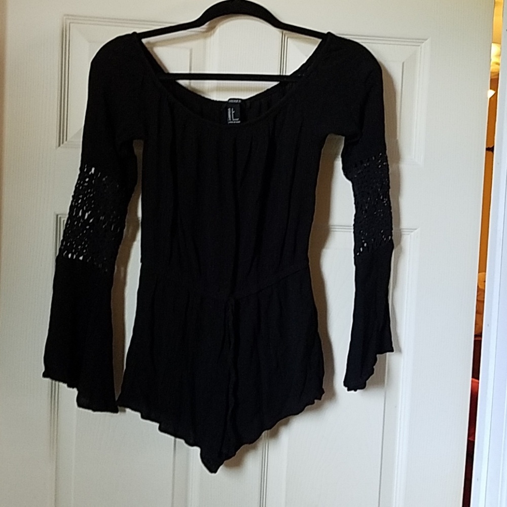 Small black romper longsleeved with cutout